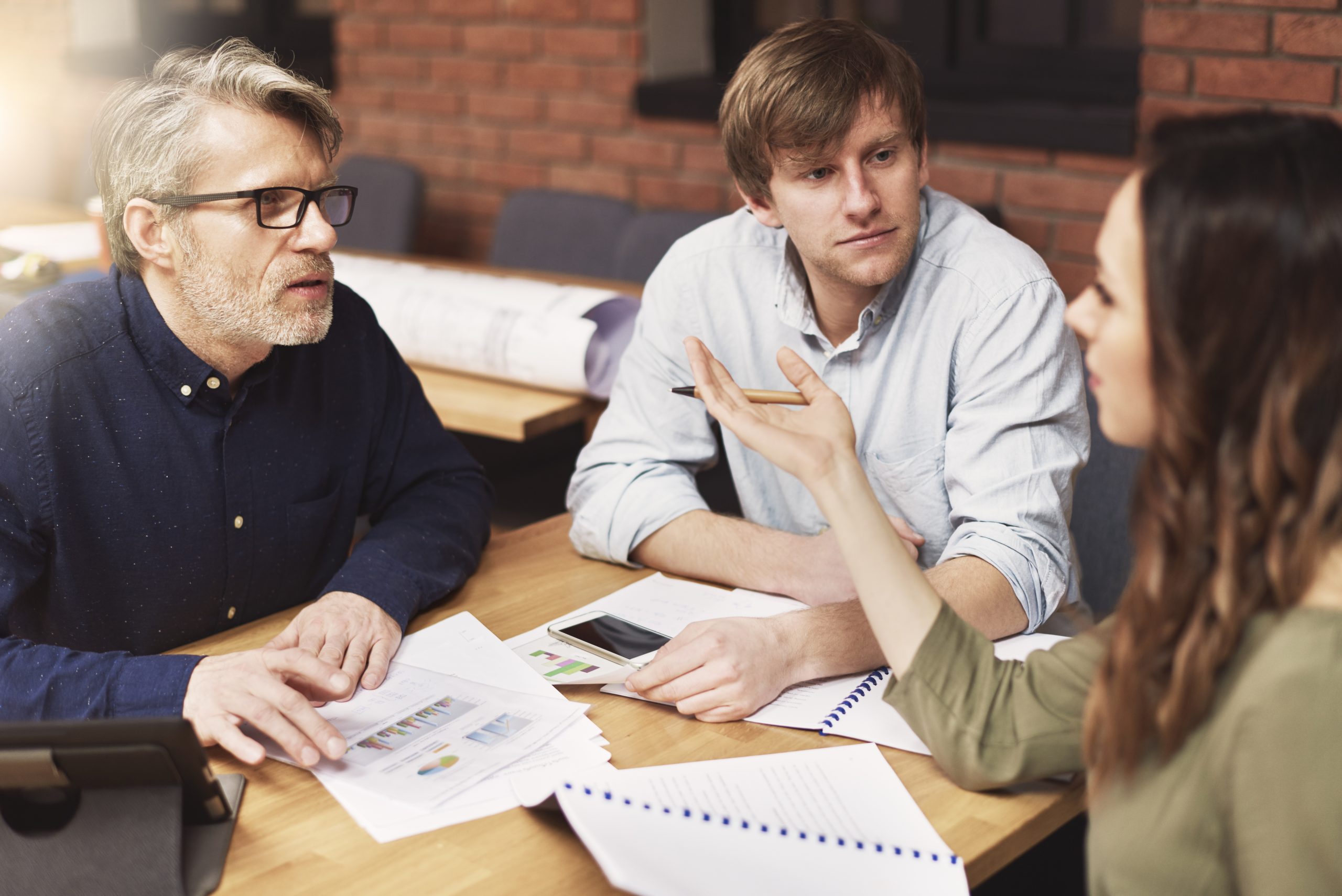 Business people talking about working